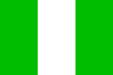 Флаг Нигерии. Столица - Абуджа, крупнейшие города - Лагос и Ибадан. Официальные языки - английский и французский,
распространенные местные языки - хауса, йоруба, игбо (ибо), фулани, канури, тив и др.